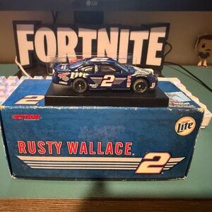 Rusty Wallace 1/64 Action #2 Miller Lite Harley Davidson 1999 Ford Taurus